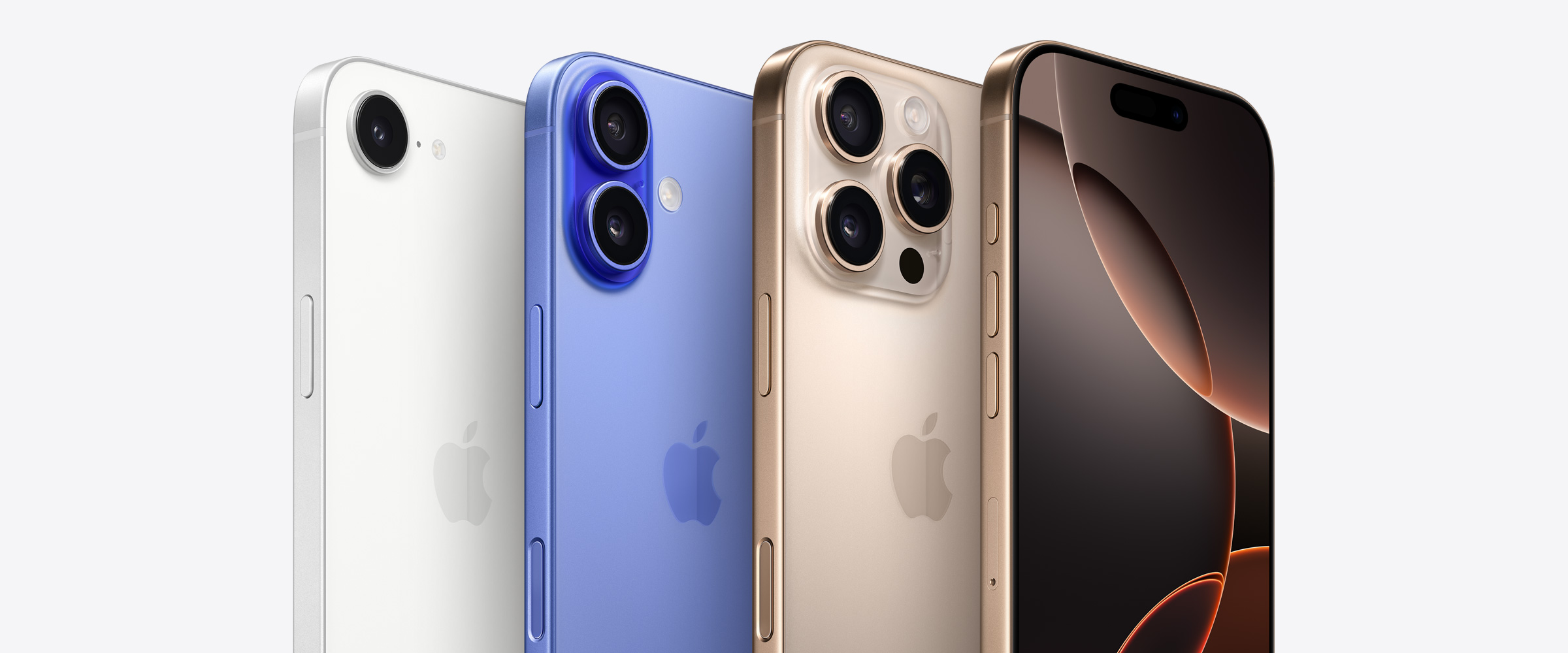 四部 iPhone 设备，其中两部沙漠色钛金属 iPhone 16 Pro 一前一后分别展示三摄镜头和灵动岛，旁边还有一部群青色 iPhone 16 展示双摄镜头，以及一部白色 iPhone 16e 机型展示单摄镜头。